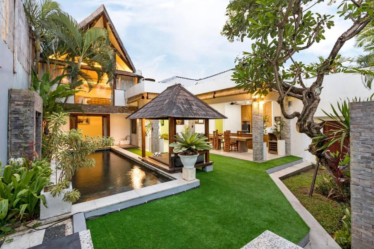 Buddha Beach Villa pool terrace surrounded by tropical greenery