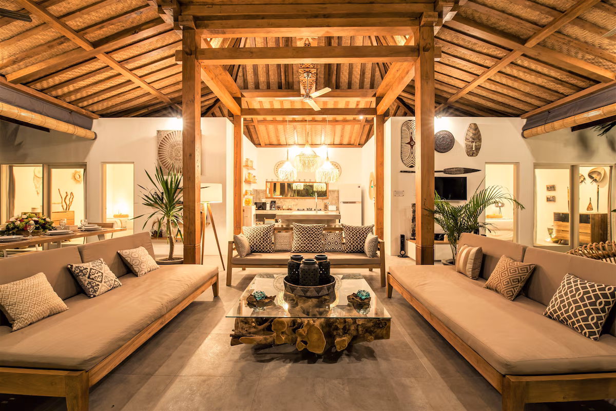 Chic Boheme villa lounge with warm lighting and natural furniture