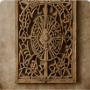 Hand-carved wooden wall panel with floral details